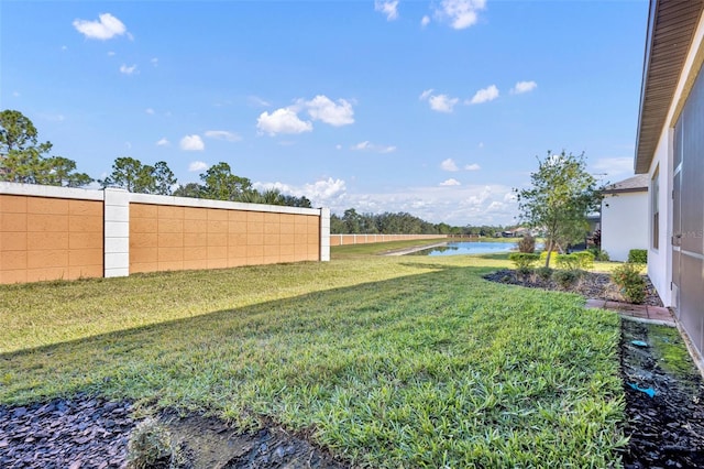 view of yard featuring a water view