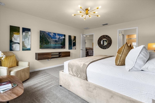 carpeted bedroom with a notable chandelier