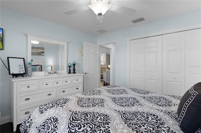 bedroom featuring ceiling fan and a closet