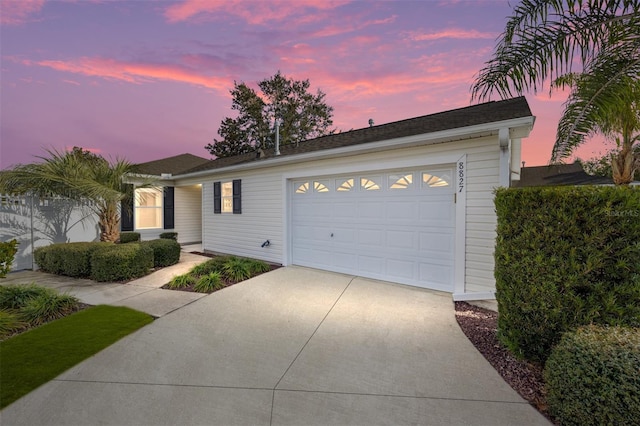 ranch-style home with a garage