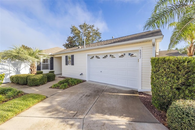 single story home featuring a garage