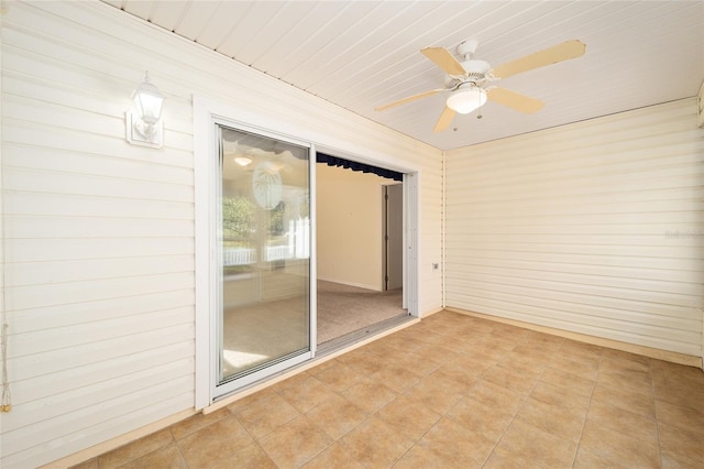 interior space featuring ceiling fan