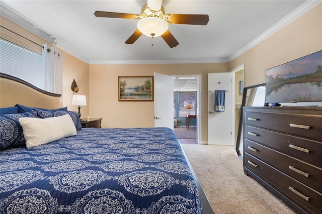 bedroom featuring ceiling fan, light colored carpet, and ornamental molding