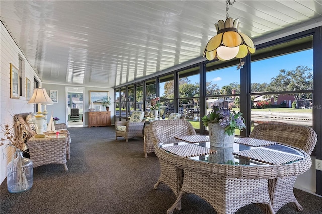 sunroom featuring plenty of natural light