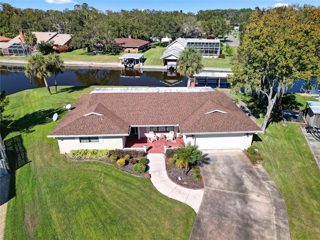 bird's eye view with a water view