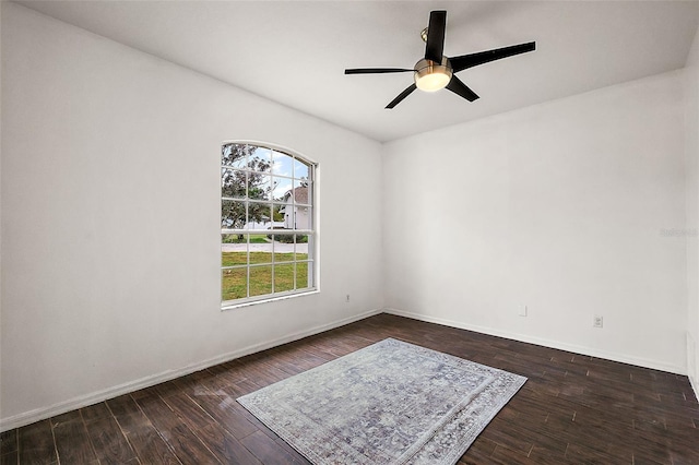 14701 Timucua Pl, Clermont, FL 34711 - spare room with ceiling fan and dark wood finished floors