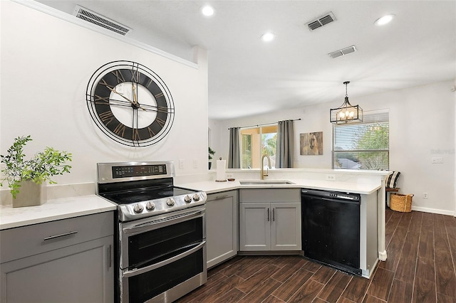 14701 Timucua Pl, Clermont, FL 34711 - kitchen featuring dishwasher, double oven range, gray cabinets, a peninsula, and recessed lighting