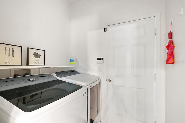 14701 Timucua Pl, Clermont, FL 34711 - laundry area featuring washing machine and dryer