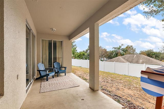 14701 Timucua Pl, Clermont, FL 34711 - fenced backyard featuring a patio