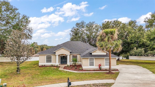 view of front of house with a front yard