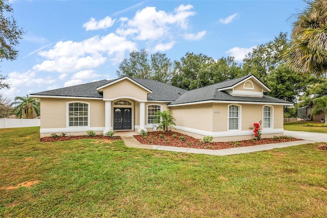 ranch-style house with a front yard