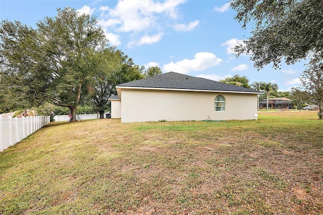 14701 Timucua Pl, Clermont, FL 34711 - view of side of property with stucco siding