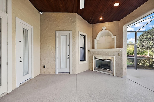 interior space featuring a fireplace and glass enclosure