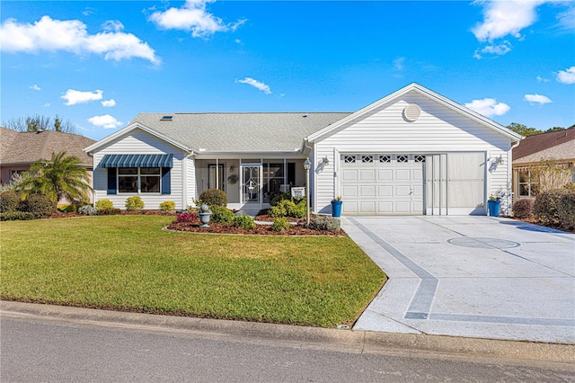 single story home featuring a front yard and a garage