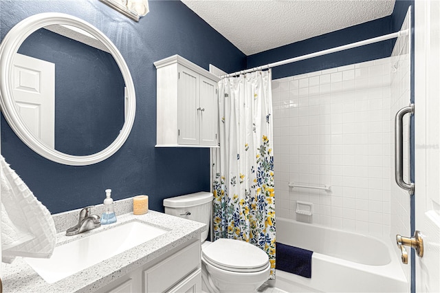 full bathroom featuring shower / bath combo with shower curtain, vanity, a textured ceiling, and toilet