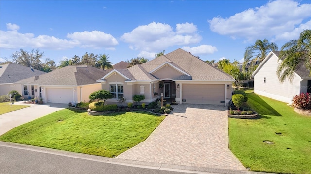 ranch-style house with a garage and a front lawn