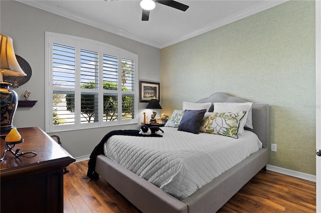 bedroom featuring dark hardwood / wood-style floors, ceiling fan, and ornamental molding