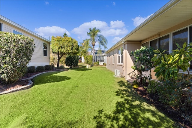 view of yard featuring ac unit