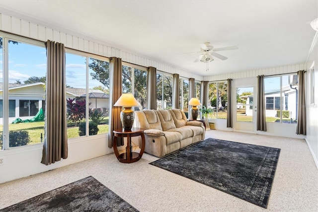 sunroom / solarium with ceiling fan