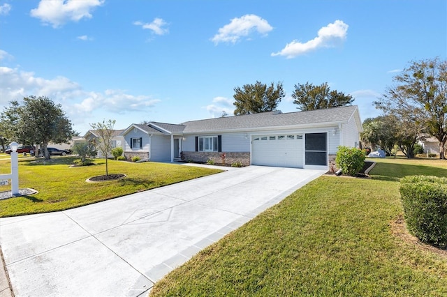 single story home featuring a front lawn and a garage