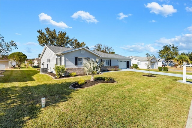 ranch-style house with central air condition unit, a front lawn, and a garage