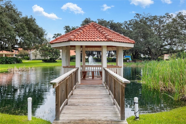 dock area featuring a gazebo and a water view