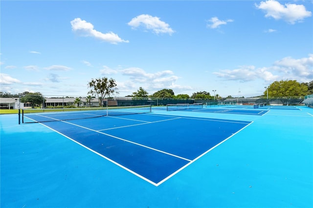 view of sport court featuring basketball hoop