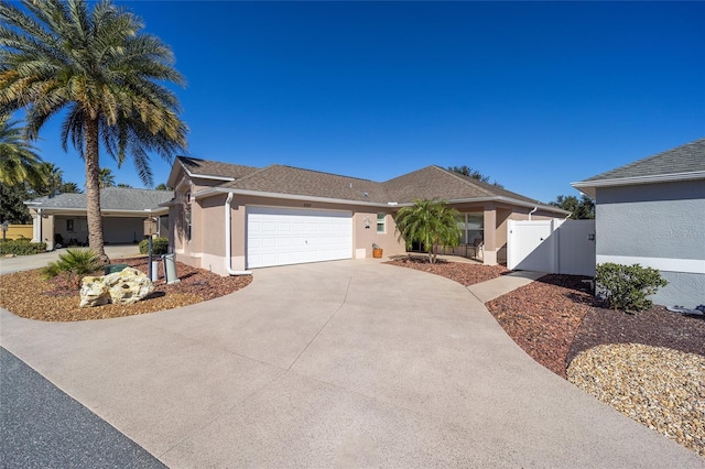 ranch-style home with a garage