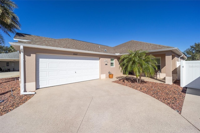 single story home with a garage