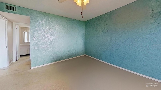 unfurnished room with ceiling fan