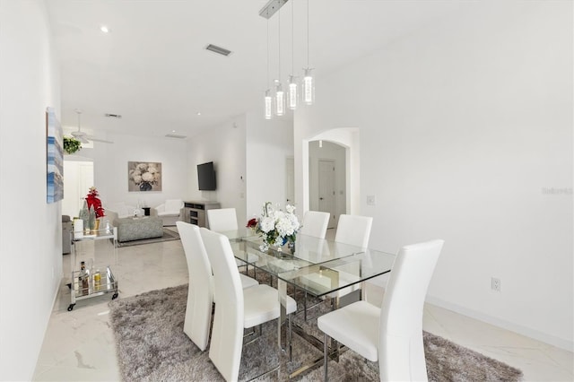 dining area featuring ceiling fan