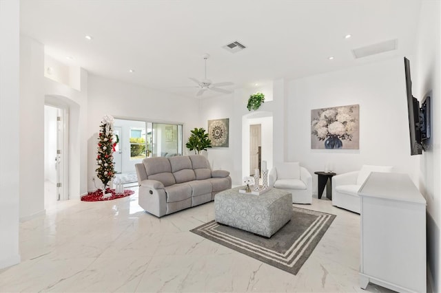 living room featuring ceiling fan