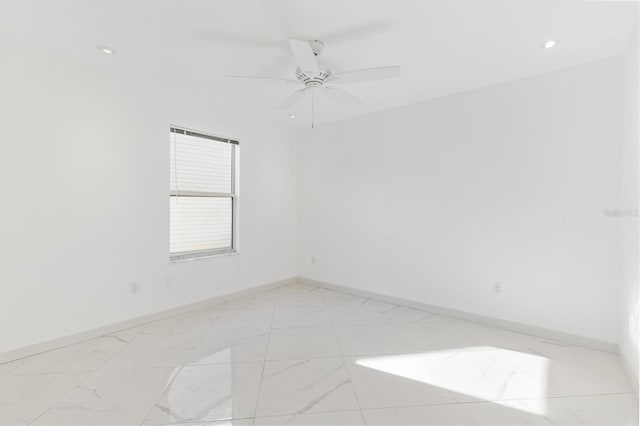 empty room featuring ceiling fan