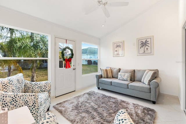 living room featuring ceiling fan and vaulted ceiling