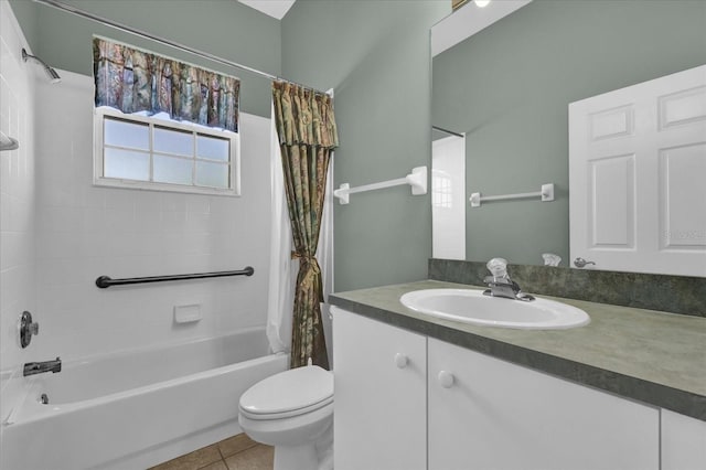 full bathroom featuring tile patterned flooring, shower / tub combo, vanity, and toilet