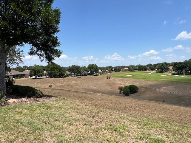 1063 Mesa Verde Ct, Clermont, FL 34711 - view of yard with golf course view