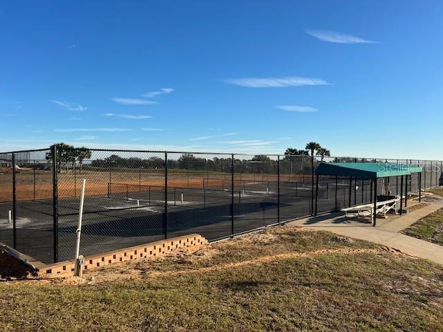 1063 Mesa Verde Ct, Clermont, FL 34711 - view of sport court with fence