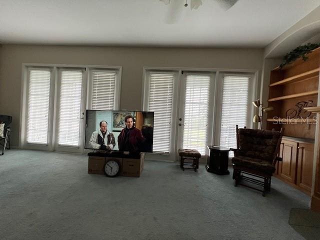 1063 Mesa Verde Ct, Clermont, FL 34711 - living area featuring a ceiling fan and carpet