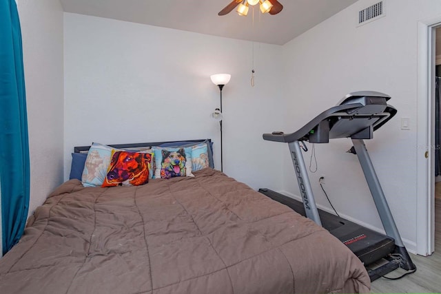 bedroom featuring light wood-type flooring and ceiling fan