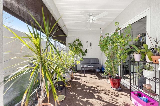 view of patio / terrace featuring ceiling fan