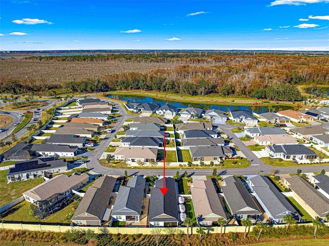 drone / aerial view featuring a water view