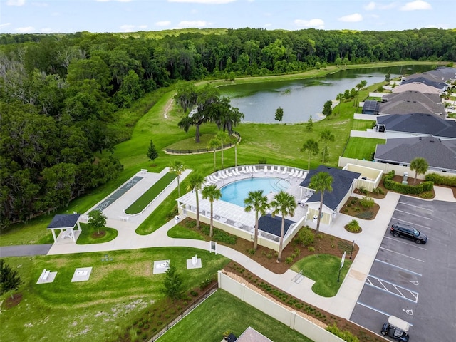 birds eye view of property featuring a water view