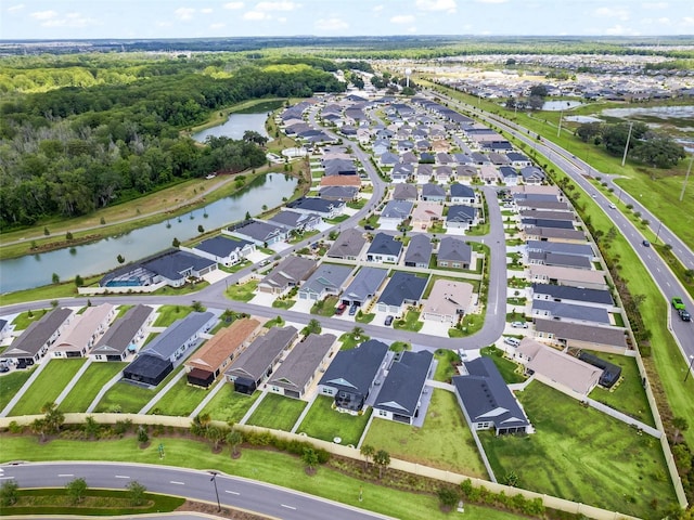 drone / aerial view featuring a water view