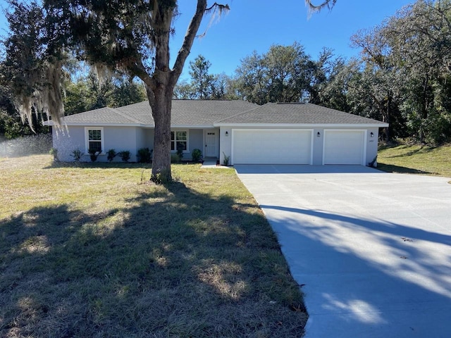 single story home featuring a front lawn, driveway, an attached garage, and stucco siding