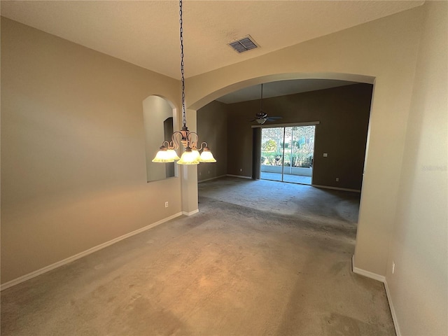 unfurnished dining area with ceiling fan with notable chandelier and carpet floors