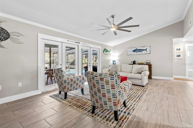 living room with french doors, crown molding, ceiling fan, and lofted ceiling