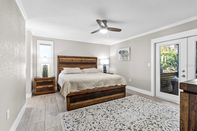 bedroom with ceiling fan, french doors, a textured ceiling, access to outside, and ornamental molding