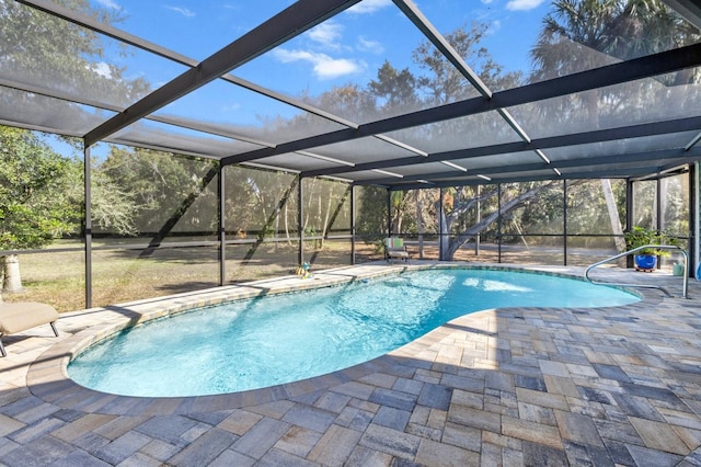 view of pool featuring a patio and a lanai