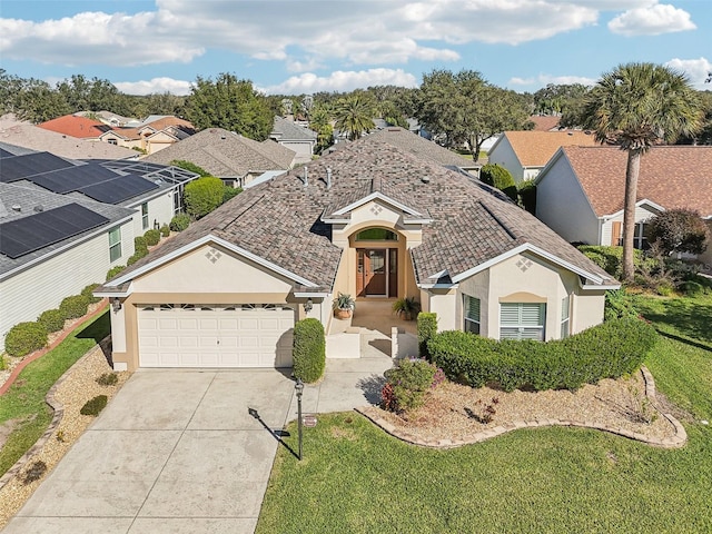 ranch-style home featuring a front yard