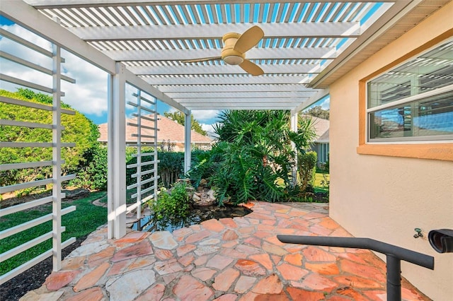 view of patio featuring a pergola and ceiling fan